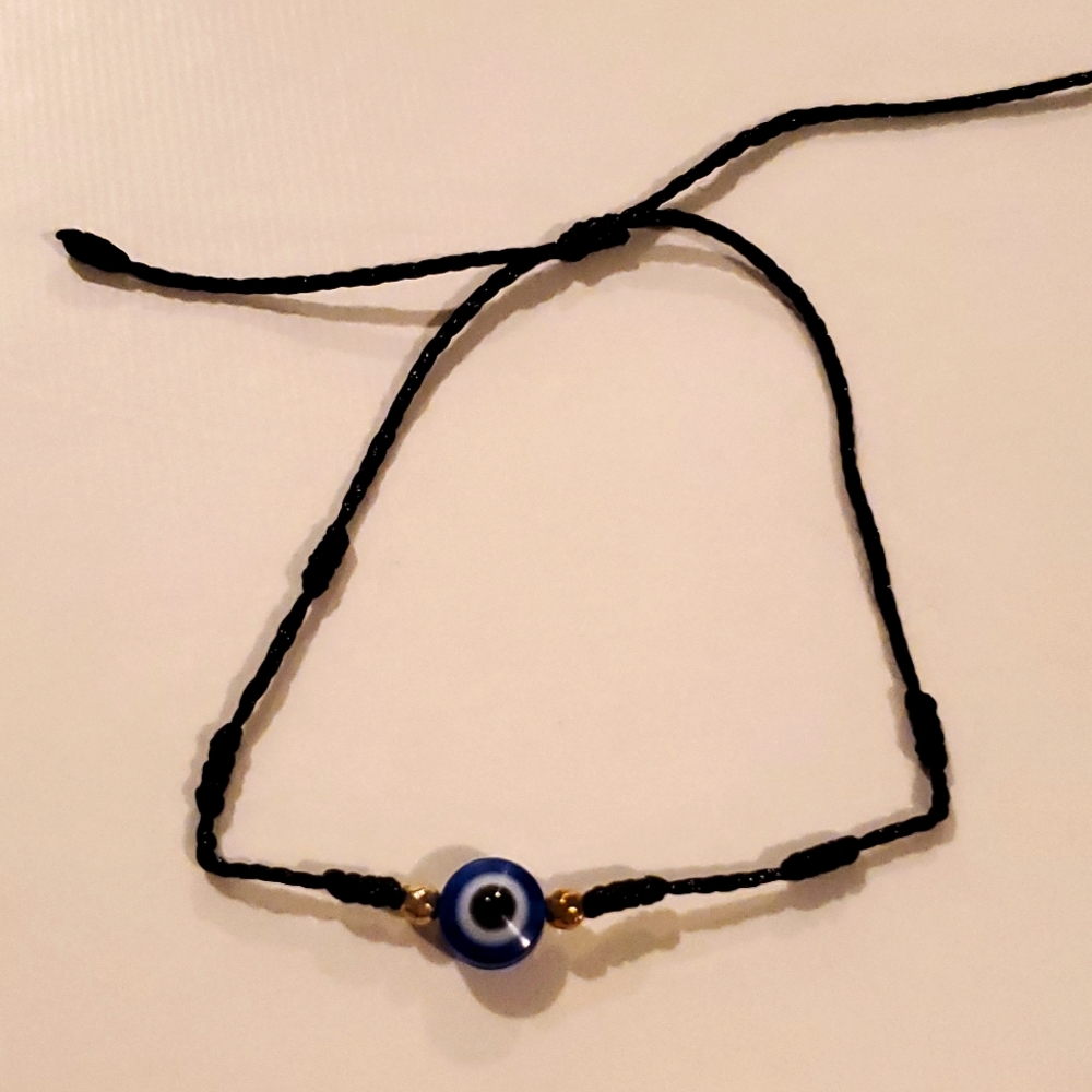 Evil eye bracelet with black string